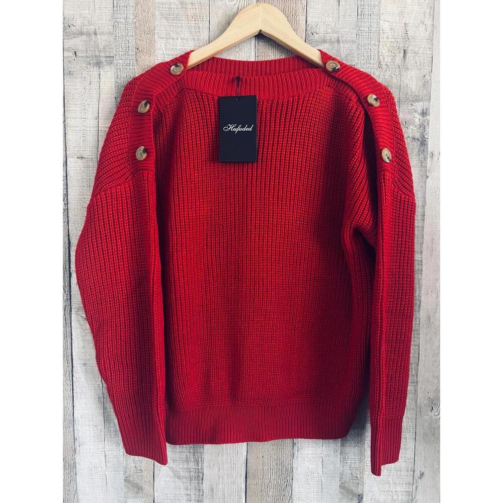 Nice sweater, with buttons on the shoulders